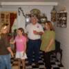 At the reception, Past Lt. Commander South Don Newman and wife Jeanette chat with Tarah and Haley Thompson